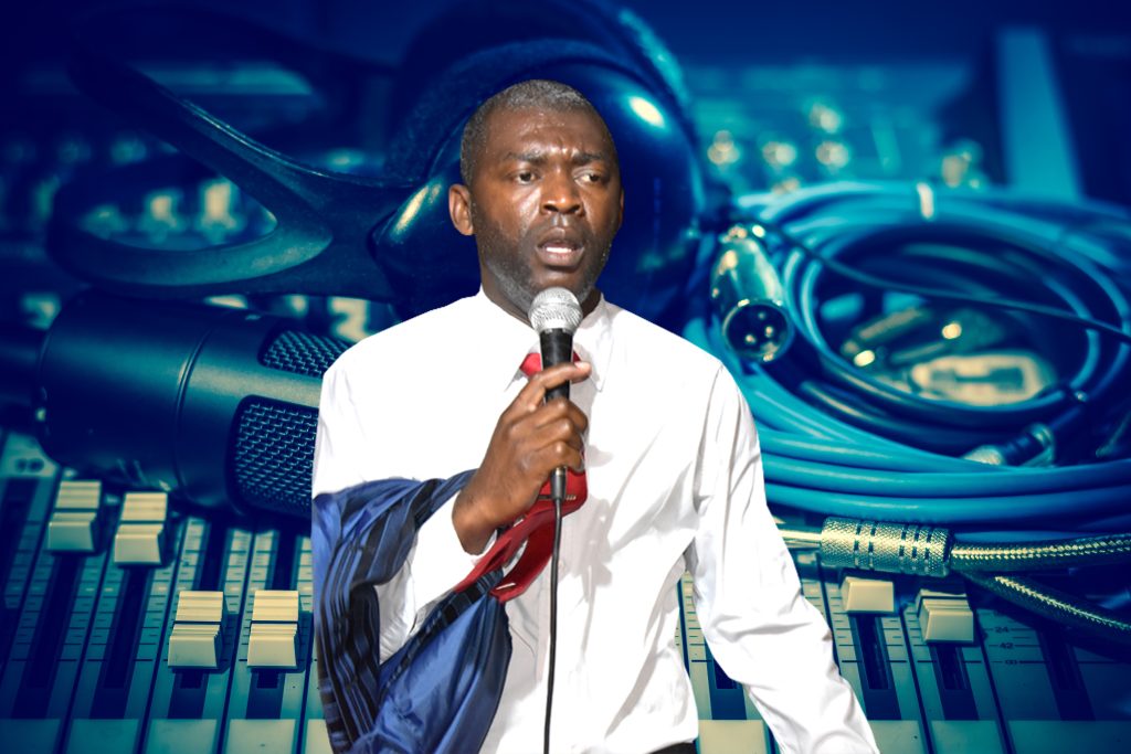 close up of microphone with headphone on mixer, music instrument