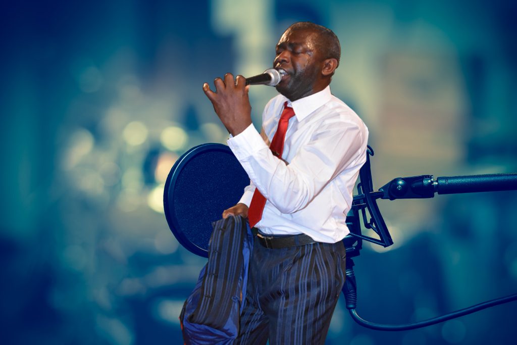 professional condenser studio microphone over the musician blurr
